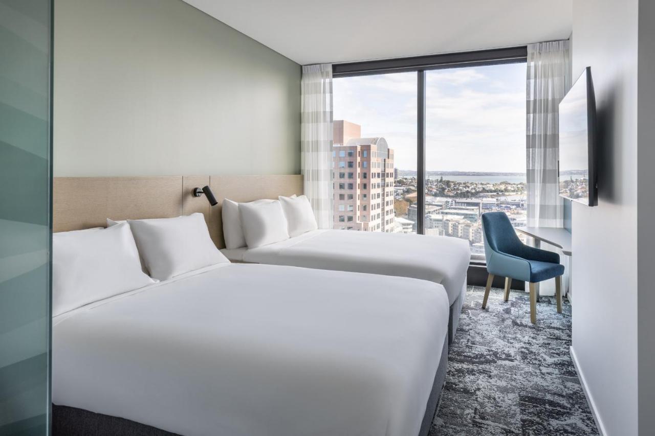 Standard Zimmer mit 2 Queensize-Betten und Hafenblick - kostenfreies Frühstück